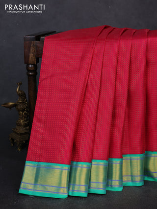 Pure kanchipuram silk saree pink and teal green with allover zari checks & self emboss and zari woven border