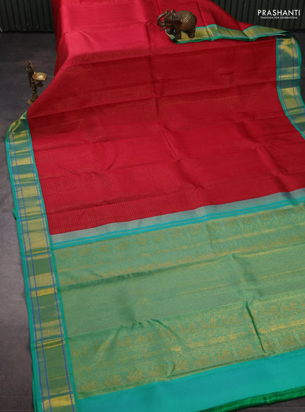 Pure kanchipuram silk saree pink and teal green with allover zari checks & self emboss and zari woven border