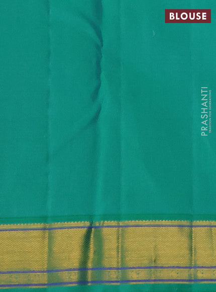 Pure kanchipuram silk saree pink and teal green with allover zari checks & self emboss and zari woven border