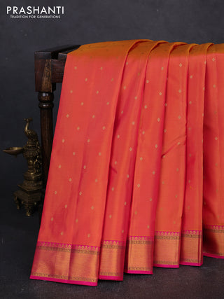 Pure kanchipuram silk saree dual shade of pinkish orange and pink with allover zari woven buttas and zari woven border