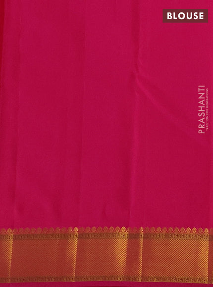 Pure kanchipuram silk saree dual shade of pinkish orange and pink with allover zari woven buttas and zari woven border