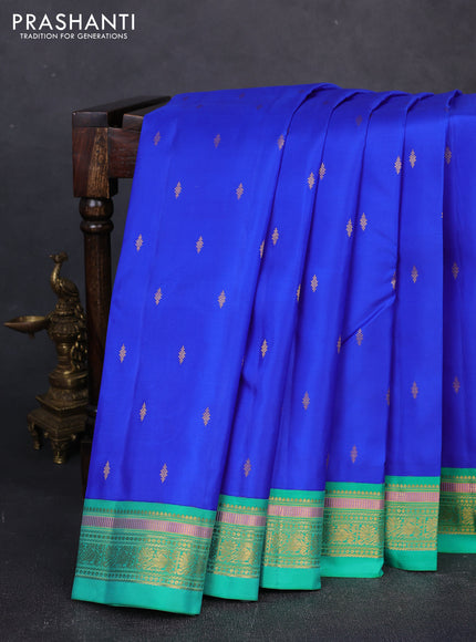 Pure kanchipuram silk saree royal blue and teal green with allover zari woven buttas and zari woven korvai border