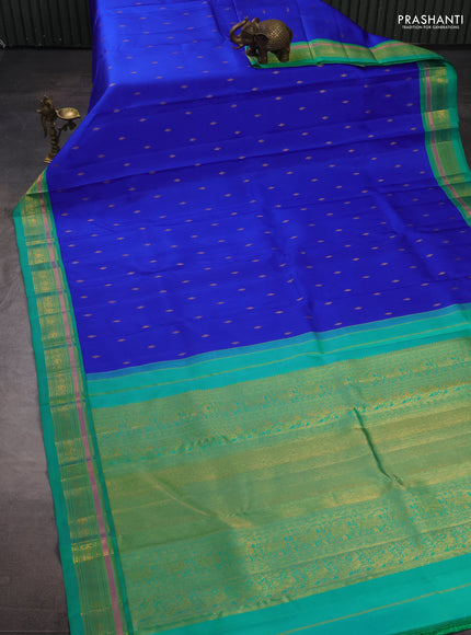 Pure kanchipuram silk saree royal blue and teal green with allover zari woven buttas and zari woven korvai border