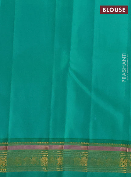 Pure kanchipuram silk saree royal blue and teal green with allover zari woven buttas and zari woven korvai border