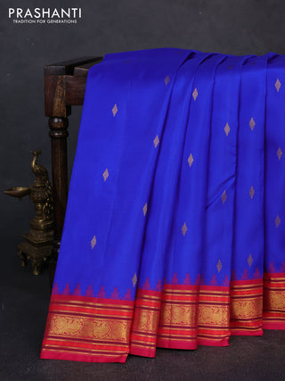 Pure kanchipuram silk saree royal blue and pink with zari woven buttas and temple design zari woven border