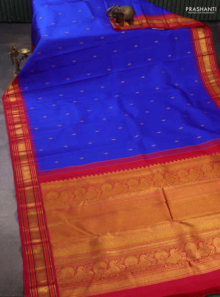 Pure kanchipuram silk saree royal blue and pink with zari woven buttas and temple design zari woven border