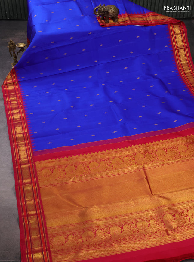 Pure kanchipuram silk saree royal blue and pink with zari woven buttas and temple design zari woven border