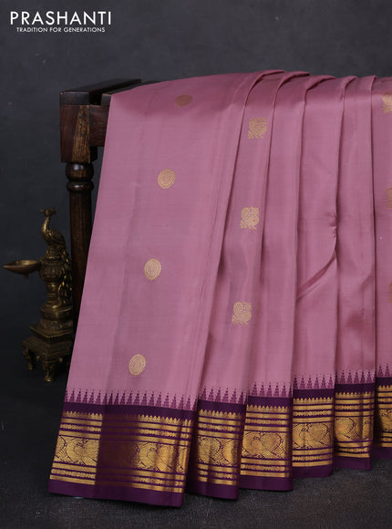 Pure kanchipuram silk saree mauve pink and violet with allover zari woven buttas and zari woven border