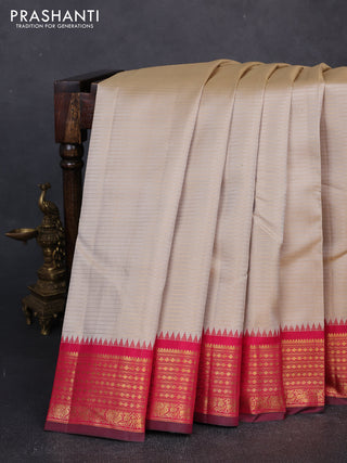 Pure kanchipuram silk saree beige and maroon with allover zari weaves and zari woven border