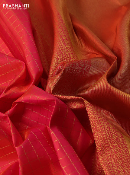 Pure kanchipuram silk saree orange and pink with allover zari checked pattern and zari woven border