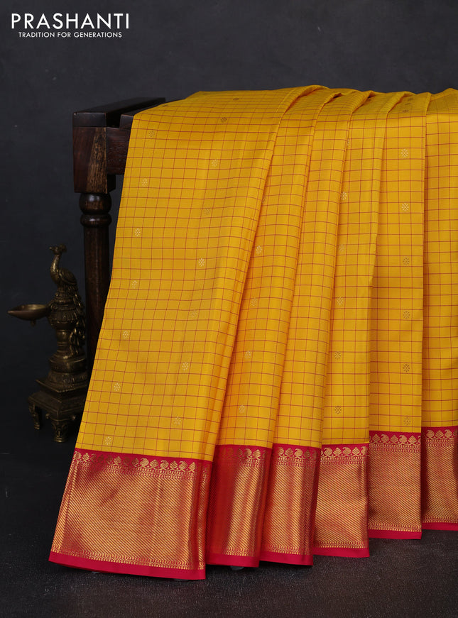 Pure kanchipuram silk saree yellow and pink with allover checks & zari woven buttas and zari woven border