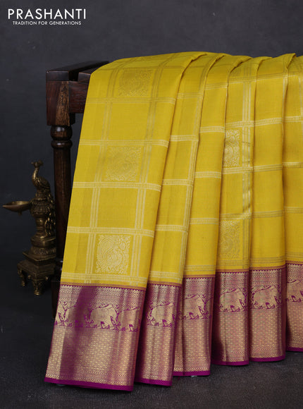 Pure kanchipuram silk saree lime yellow and purple with allover checks & buttas and zari woven border