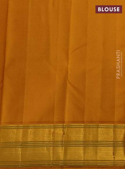 Pure kanchipuram silk saree bottle green and mustard yellow with zari woven buttas and zari woven border