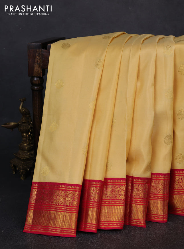 Pure kanchipuram silk saree pale yellow and pink with zari woven buttas and zari woven korvai border