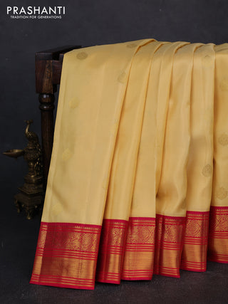 Pure kanchipuram silk saree pale yellow and pink with zari woven buttas and zari woven korvai border