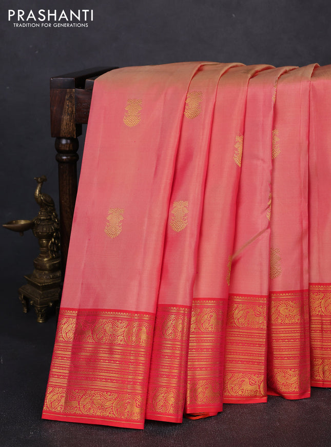 Pure kanchipuram silk saree peach shade and red with zari woven buttas and long zari woven border
