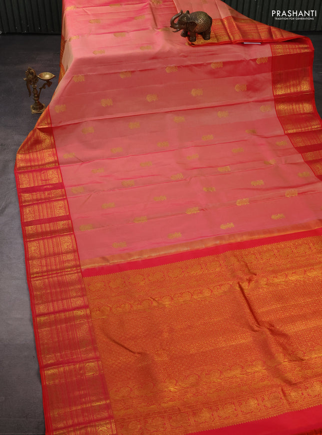 Pure kanchipuram silk saree peach shade and red with zari woven buttas and long zari woven border