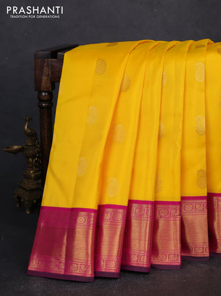 Pure kanchipuram silk saree yellow and magenta pink with zari woven buttas and zari woven korvai border