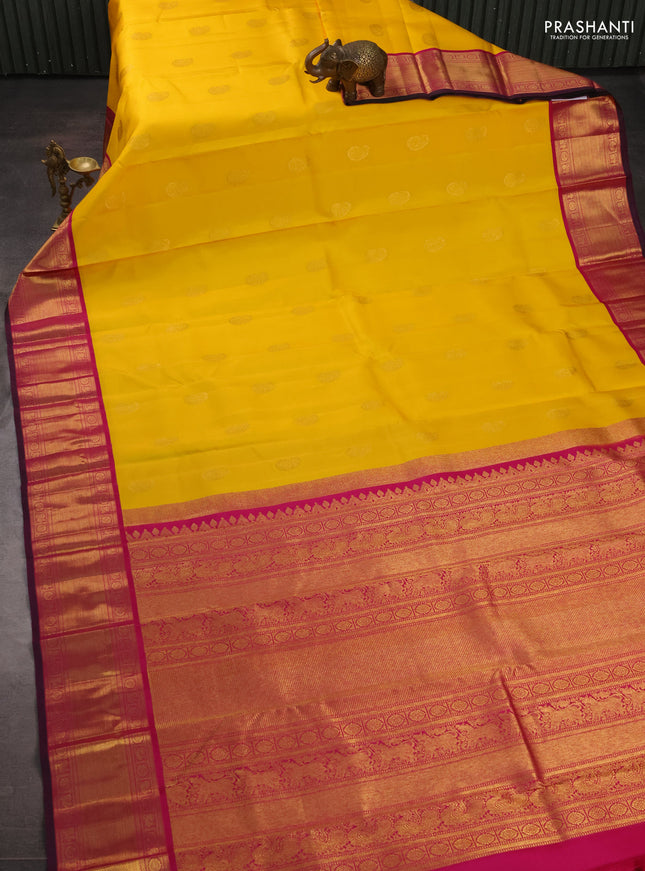 Pure kanchipuram silk saree yellow and magenta pink with zari woven buttas and zari woven korvai border