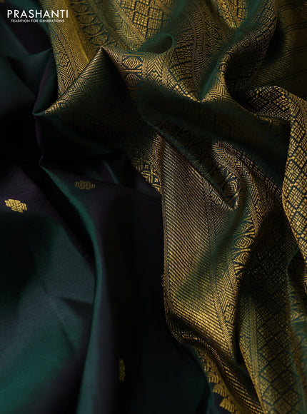 Pure kanchipuram silk saree bottle green with allover zari woven buttas and long zari woven border