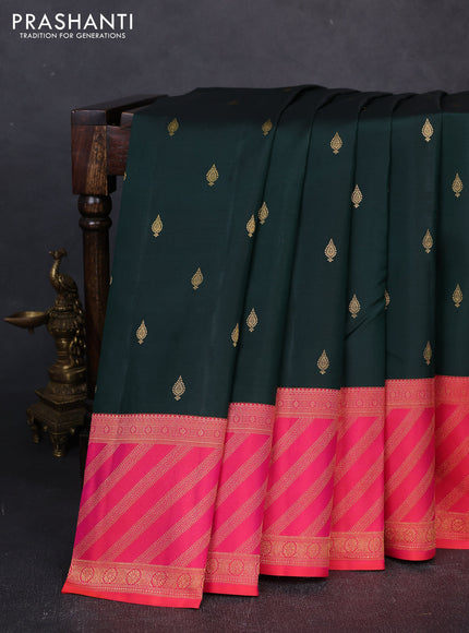 Pure kanchipuram silk saree bottle green and orange with allover zari woven buttas and long zari woven border