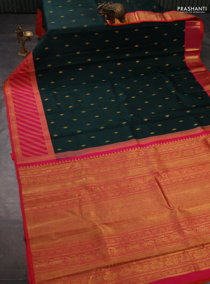 Pure kanchipuram silk saree bottle green and orange with allover zari woven buttas and long zari woven border