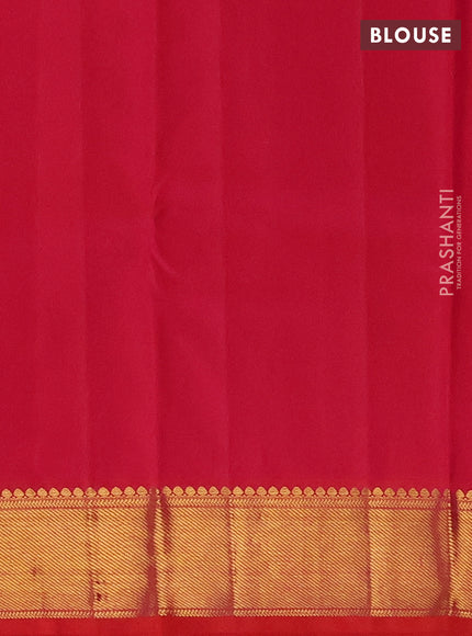Pure kanchipuram silk saree bottle green and orange with allover zari woven buttas and long zari woven border