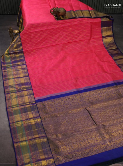 Pure kanchipuram silk saree peach pink and blue with allover zari checked pattern and long zari woven border