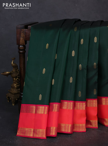 Pure kanchipuram silk saree bottle green and tomato pink with zari woven buttas and rettapet zari woven border