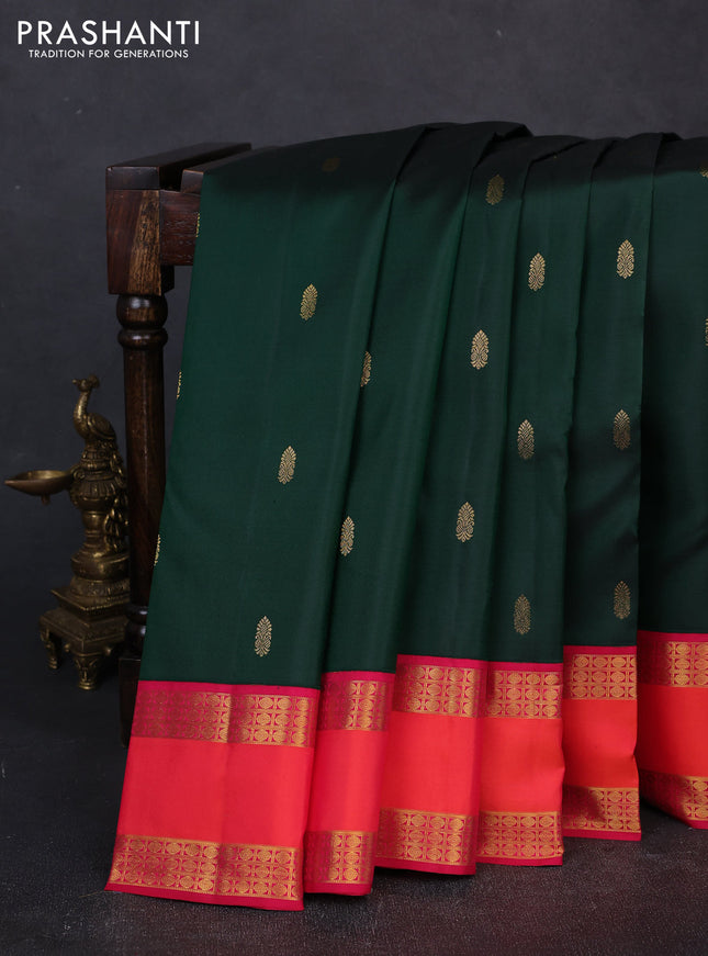 Pure kanchipuram silk saree bottle green and tomato pink with zari woven buttas and rettapet zari woven border