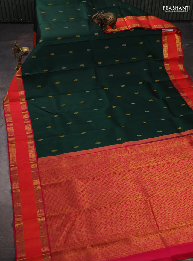 Pure kanchipuram silk saree bottle green and tomato pink with zari woven buttas and rettapet zari woven border