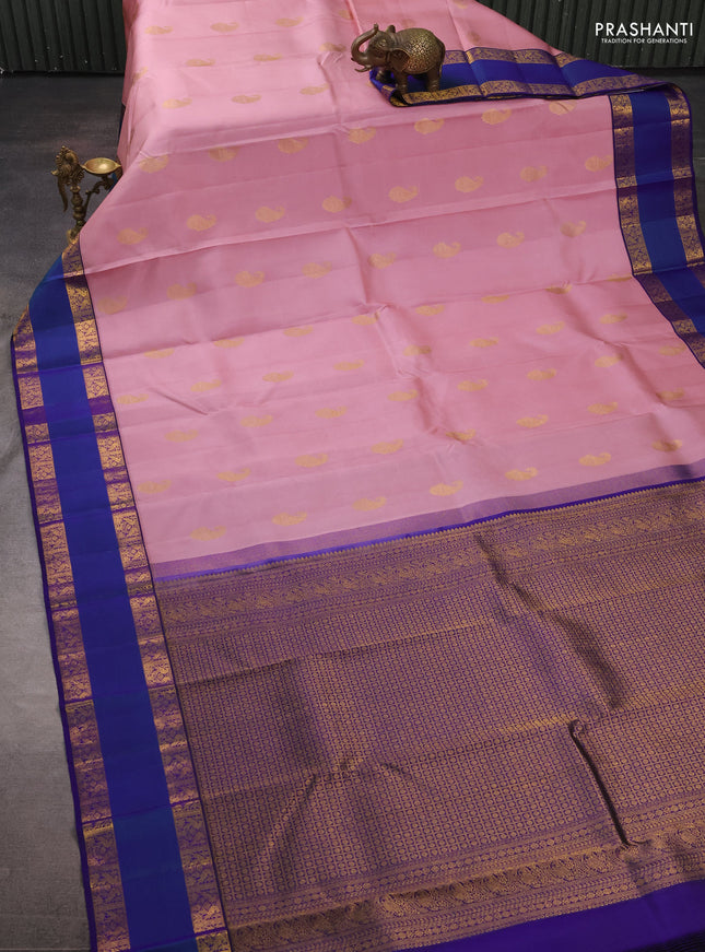 Pure kanchipuram silk saree peach pink and violet with zari woven buttas and rettapet zari woven border