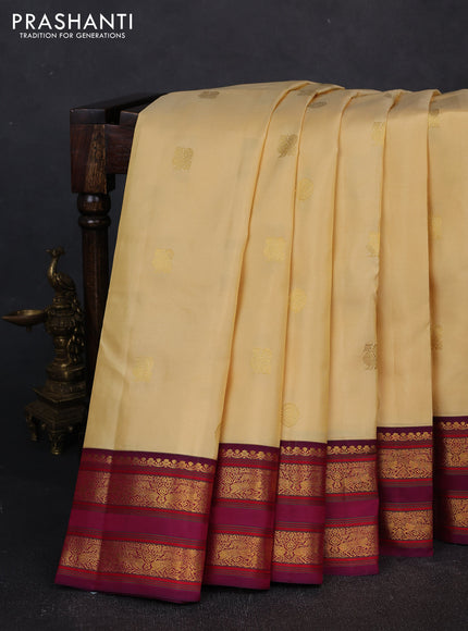 Pure kanchipuram silk saree pale yellow and magenta pink with zari woven buttas and rettapet zari woven border