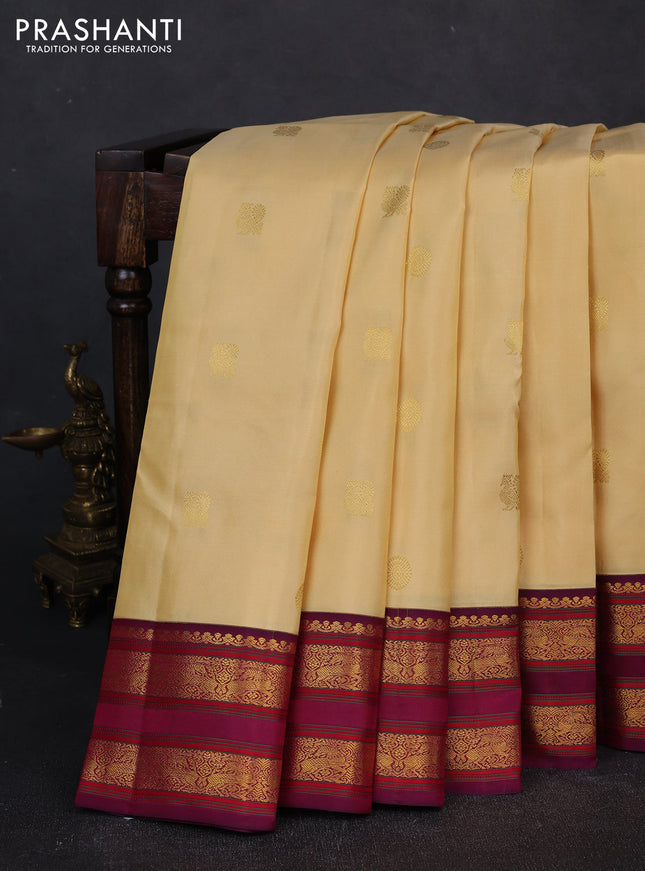 Pure kanchipuram silk saree pale yellow and magenta pink with zari woven buttas and rettapet zari woven border