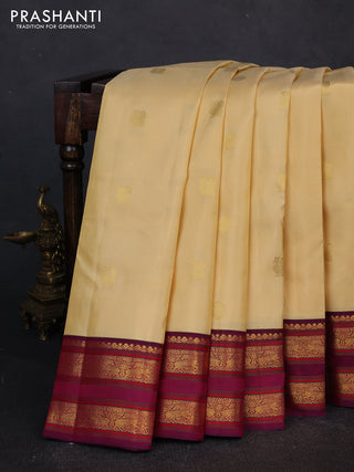 Pure kanchipuram silk saree pale yellow and magenta pink with zari woven buttas and rettapet zari woven border