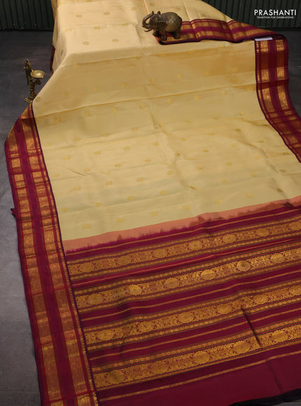 Pure kanchipuram silk saree pale yellow and magenta pink with zari woven buttas and rettapet zari woven border