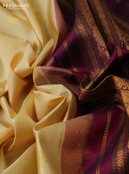 Pure kanchipuram silk saree pale yellow and magenta pink with zari woven buttas and rettapet zari woven border