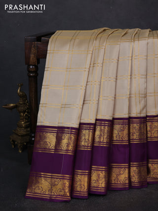 Pure kanchipuram silk saree beige and purple with allover zari checked pattern and long rettapet zari woven border