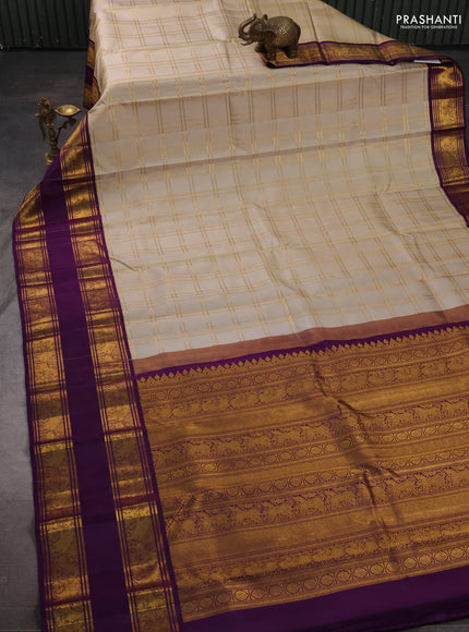 Pure kanchipuram silk saree beige and purple with allover zari checked pattern and long rettapet zari woven border