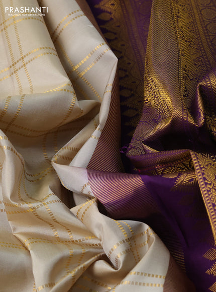 Pure kanchipuram silk saree beige and purple with allover zari checked pattern and long rettapet zari woven border