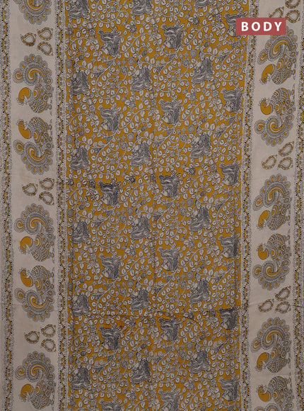 Kalamkari semi silk saree mustard yellow and beige with allover prints and printed border
