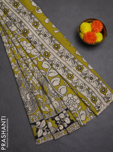 Kalamkari semi silk saree light green and black with allover prints and printed border