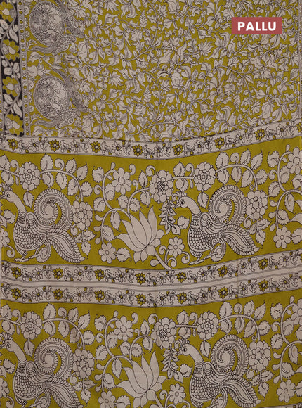Kalamkari semi silk saree light green and black with allover prints and printed border