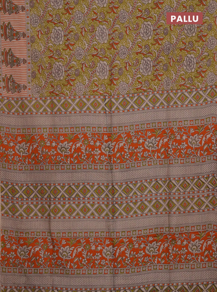 Kalamkari semi silk saree light green and orange with allover prints and printed border