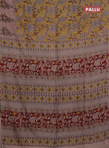 Kalamkari semi silk saree mustard yellow and maroon with allover prints and printed border