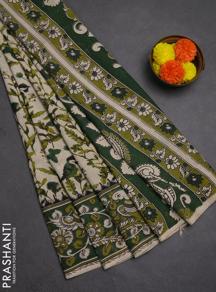 Kalamkari semi silk saree beige and green with allover prints and printed border