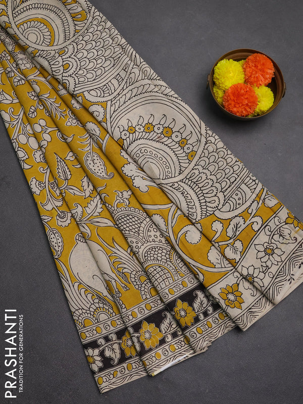 Kalamkari semi silk saree mustard yellow and black with allover prints and printed border