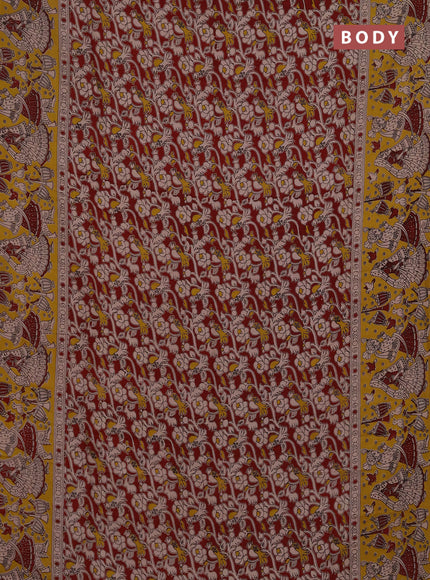 Kalamkari semi silk saree maroon and yellow with allover prints and printed border
