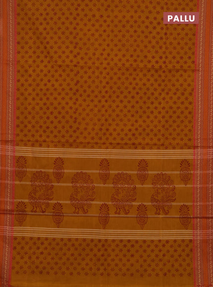 Chettinad cotton saree mustard yellow and orange with allover butta prints and thread woven border