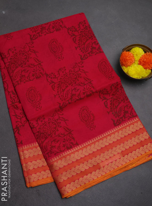 Chettinad cotton saree pink and sunset orange with allover prints and thread woven border